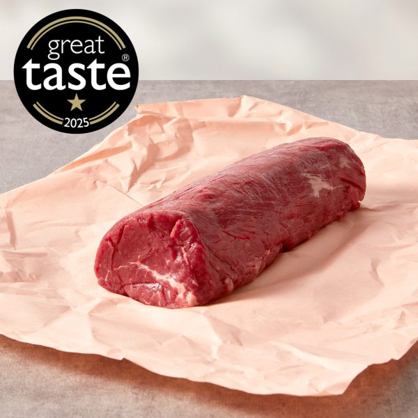 Beef fillet centre cut on pink butchery paper