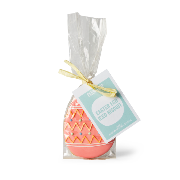 Pink decorated iced easter biscuit in packaging
