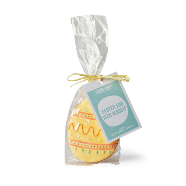 Yellow decorated iced easter biscuit in packaging