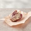 Marinated lamb henry in pink butchery paper