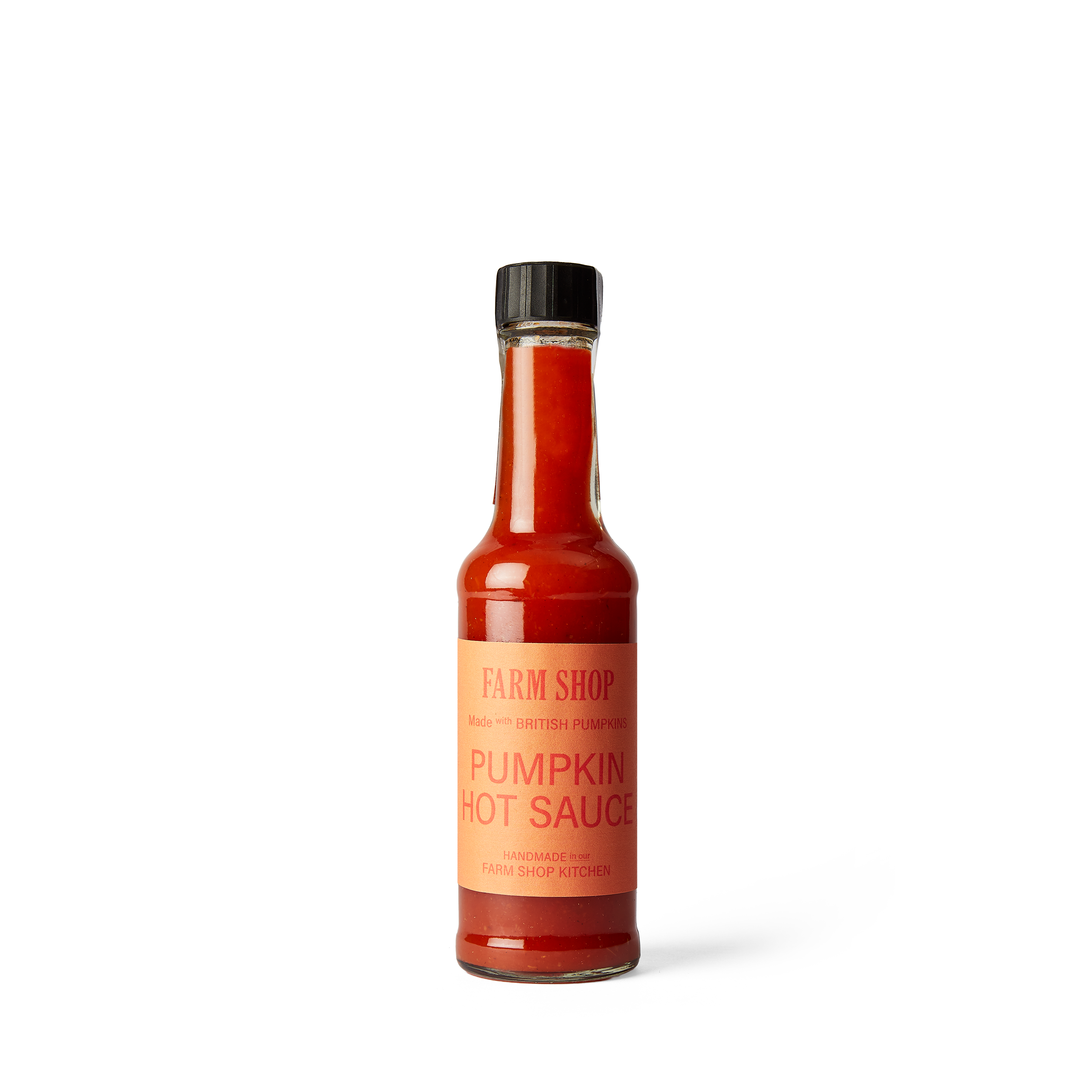 Jar of pumpkin hot sauce with an orange label